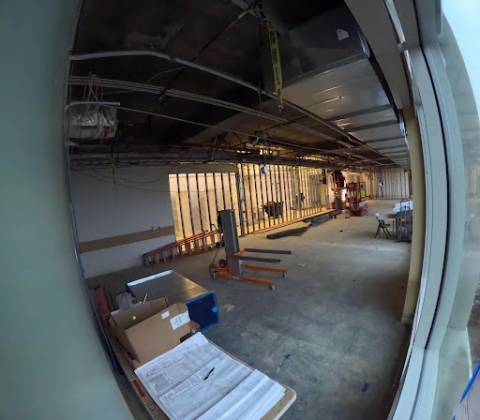 View of 4th floor new archives space with framed metal wall in background