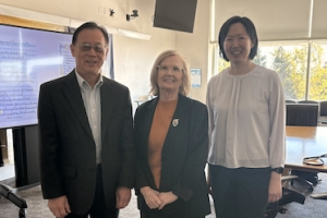 University Librarian Haipeng Li, author Betty Blanks, and librarian Emily Lin